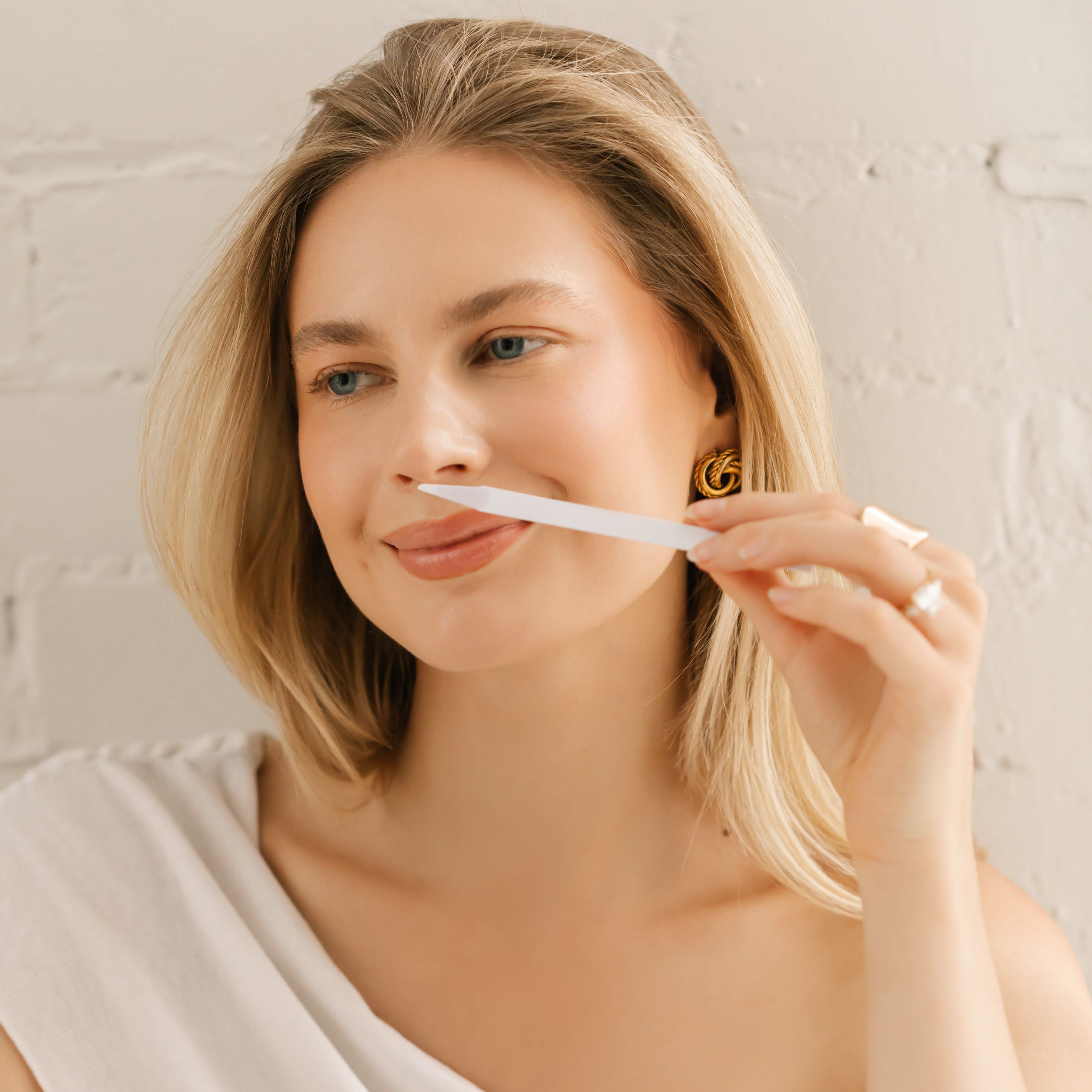 women is making a perfume in the perfume making workshop in edmonton