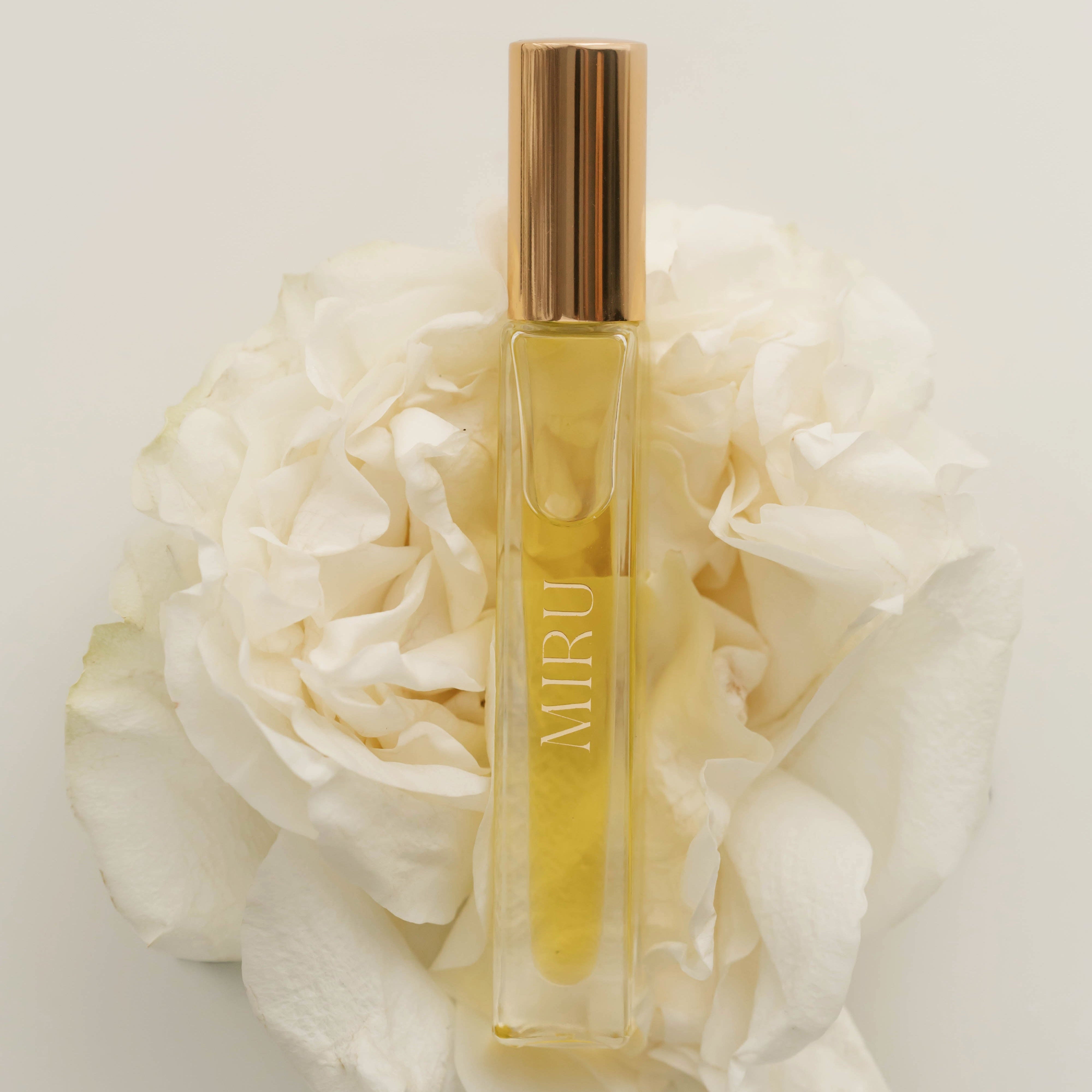 korean inspired perfume mde in Canada. 10 mls travel size floral, woody, and citrus perfume bottle